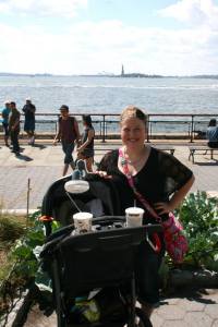 Looking at the Statue of Liberty in the background.