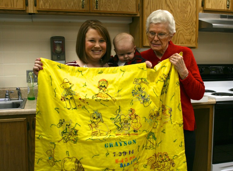 My great grandma, Grayson's great great grandma hand stitched him a blanket! Each one of us grandkids have one.