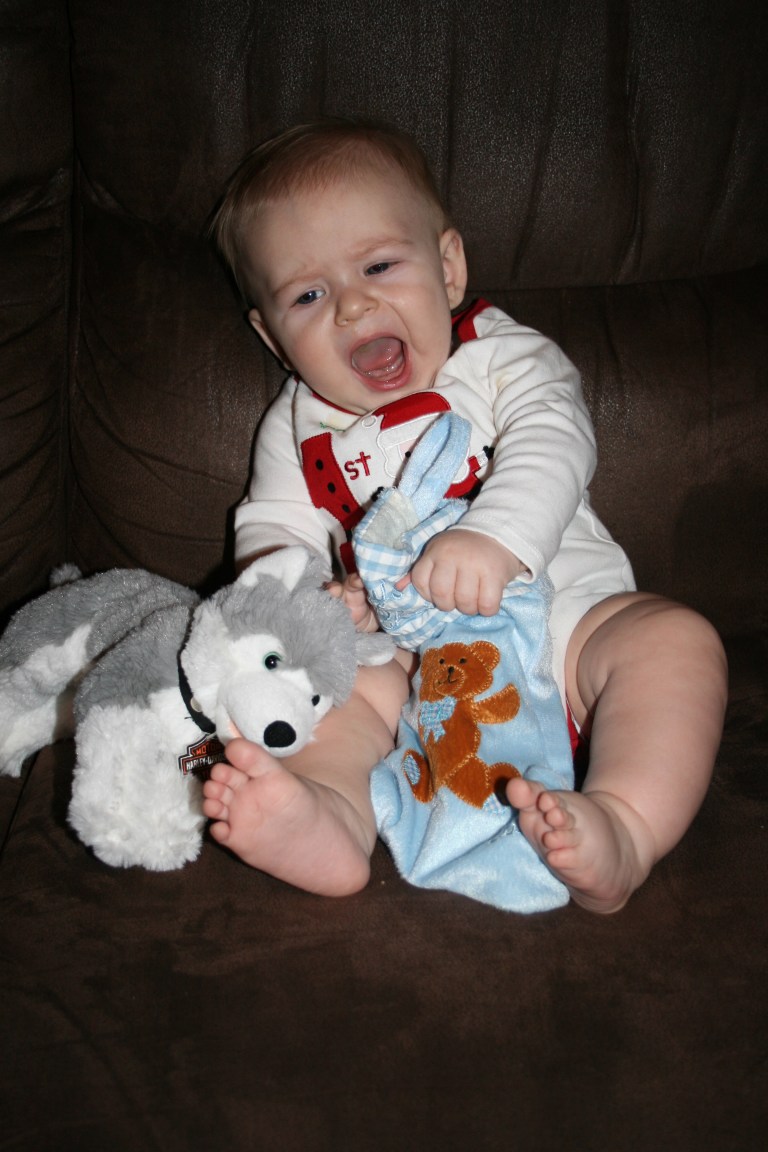 Opening his stocking. 